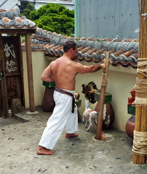 Karate training at makiwara